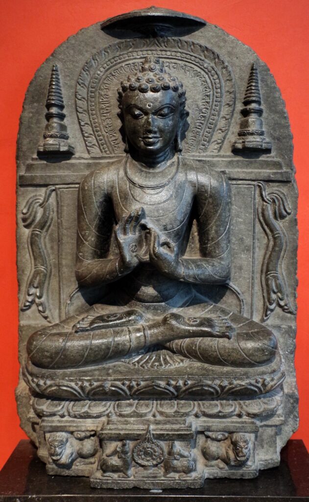 Buddha teaching Dharma, on lion throne, with mudra and mantra, stupas, schist, Chicago Art Institute, Chicago, Illinois, USA.